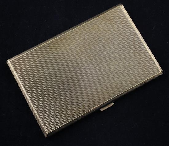 A 1940s engine turned 9ct gold cigarette case, 5in.